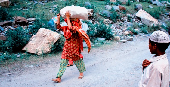 Woman carrying load in Kashmir