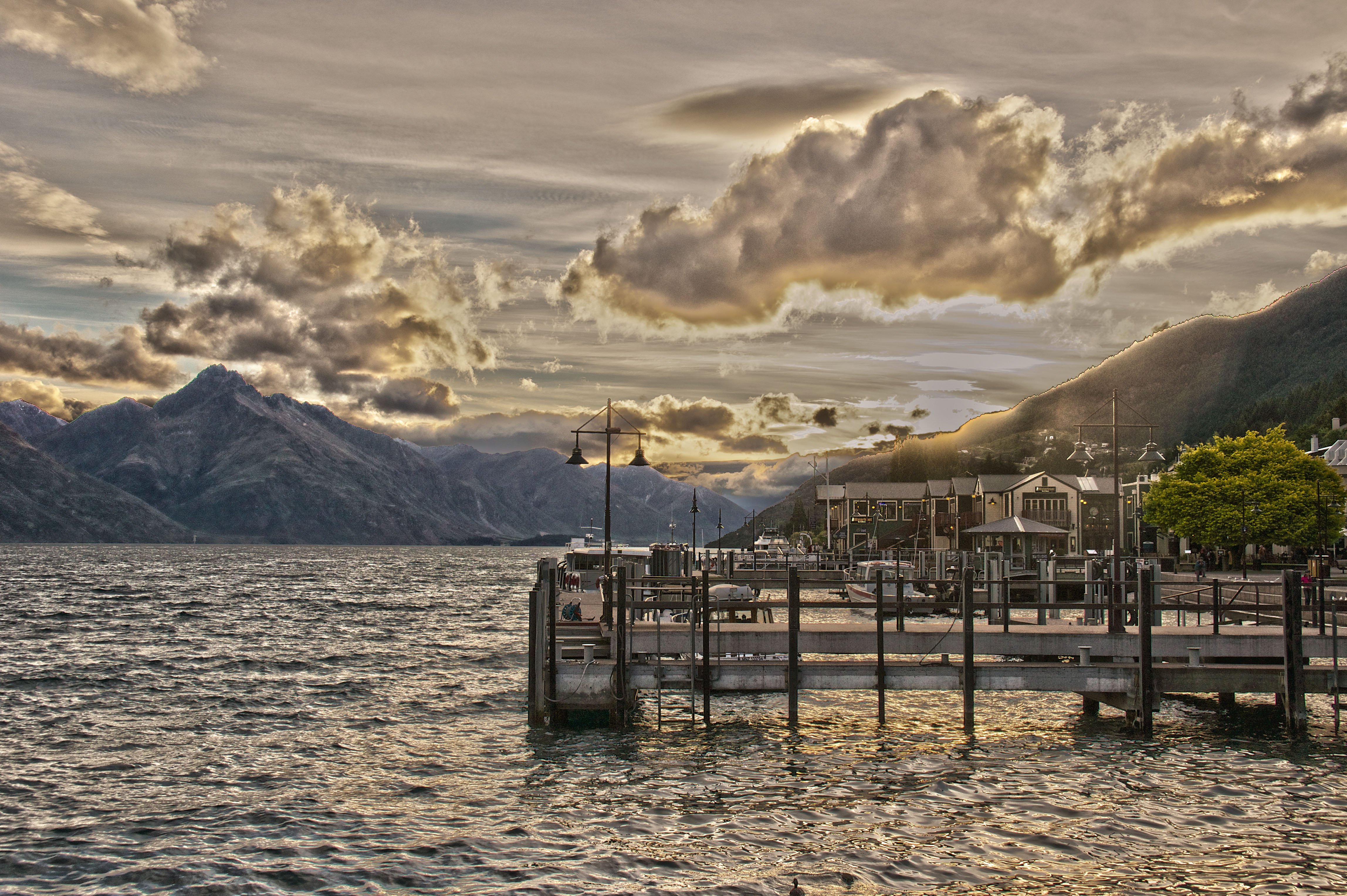 The harbor in downtown Queenstown at sunset